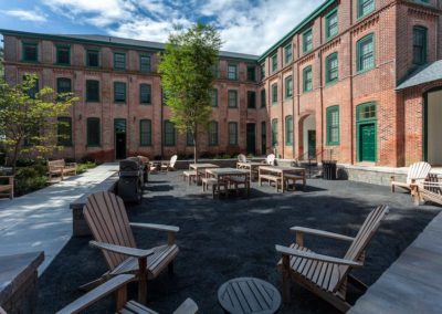 Outdoor beer garden and courtyard at Sharples Works apartments in West Chester, PA